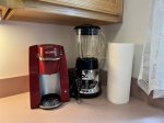 Kitchen counter with a Keurig coffee maker and blender